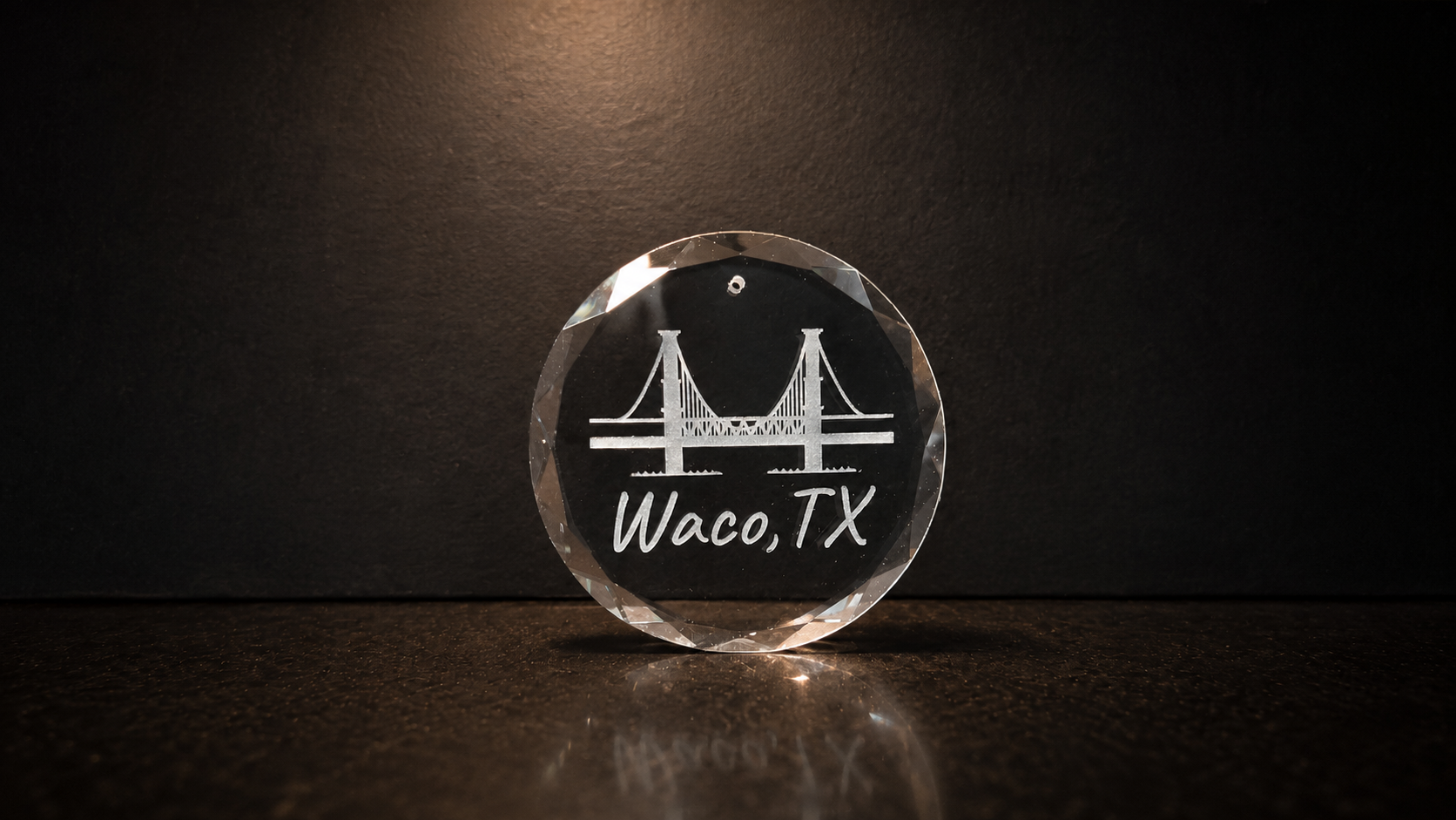 Custom laser engraved crystal ornament with Waco design